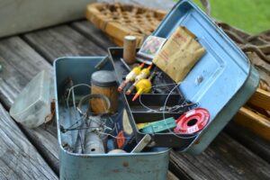 Coarse Fishing Tackle box with various pieces of tackle showing